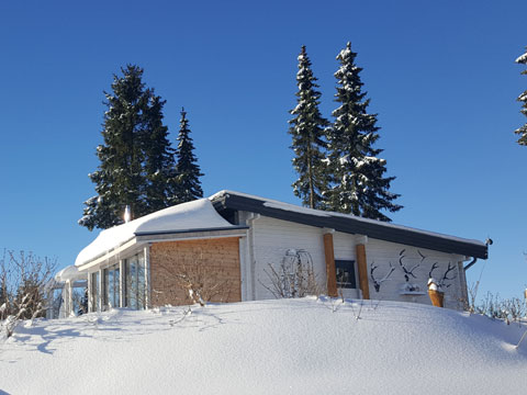Blockhaus im Winter